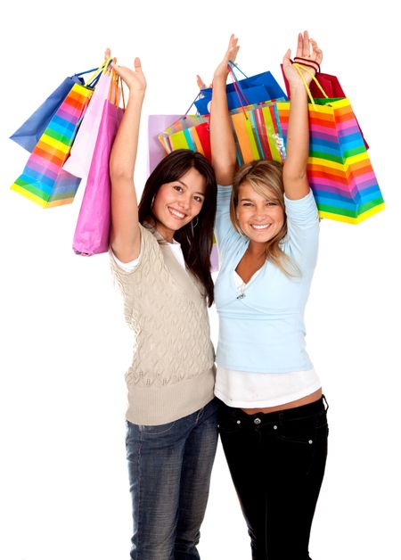 Happy shopping women isolated over a white background