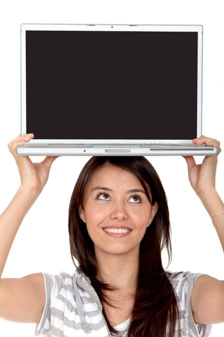 Woman with a laptop on her head isolated over a white background
