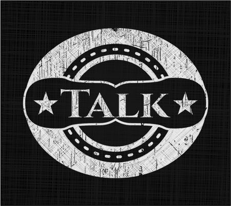 Talk chalk emblem written on a blackboard