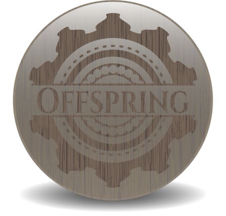 Offspring badge with wooden background