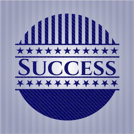 Success emblem with denim texture