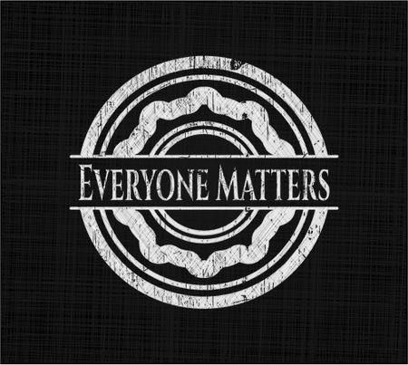 Everyone Matters chalk emblem written on a blackboard