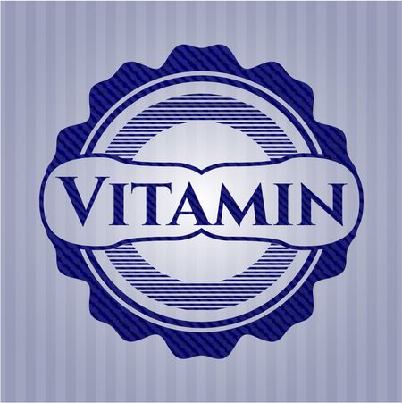 Vitamin emblem with denim high quality background