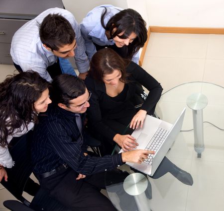 Business group with a laptop at the office