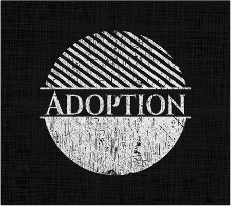 Adoption chalk emblem written on a blackboard