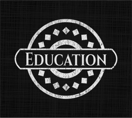 Education chalkboard emblem on black board