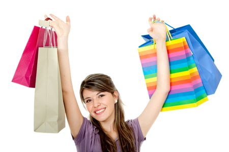 happy woman smiling with shopping bags isolated over a white background