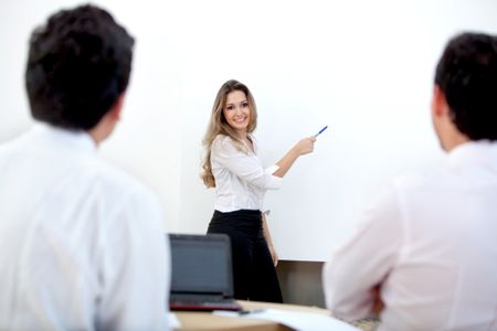 business woman doing a presentation in an office
