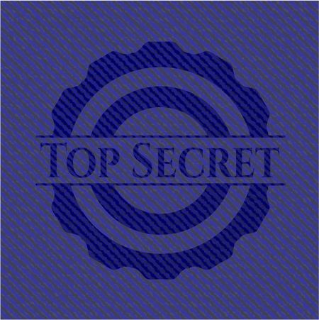 Top Secret emblem with jean background