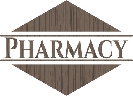Pharmacy badge with wooden background