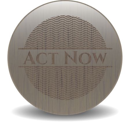 Act Now wooden emblem