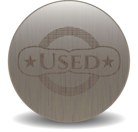 Used vintage wooden emblem