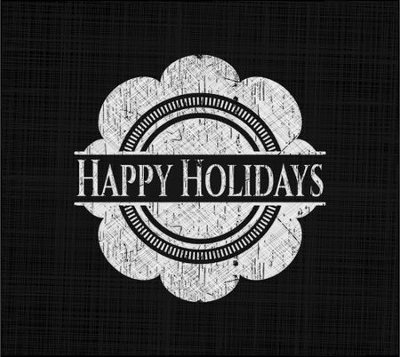 Happy Holidays chalkboard emblem written on a blackboard