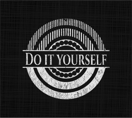 Do it yourself chalk emblem written on a blackboard