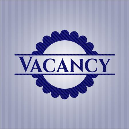 Vacancy emblem with jean background