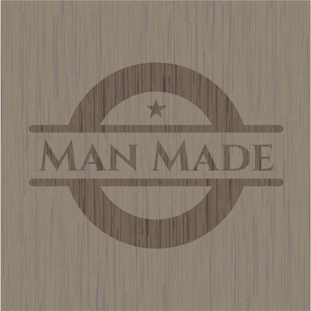 Man Made wooden emblem