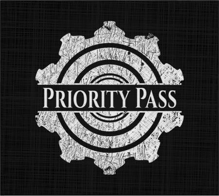 Priority Pass chalk emblem written on a blackboard