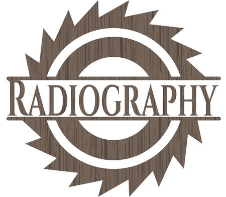 Radiography badge with wooden background