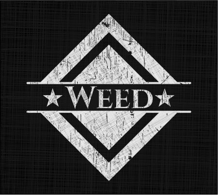 Weed chalk emblem written on a blackboard