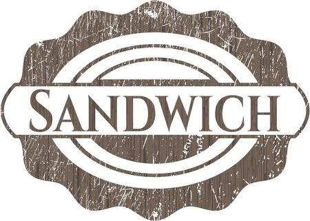 Sandwich badge with wood background