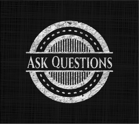 Ask Questions written on a blackboard