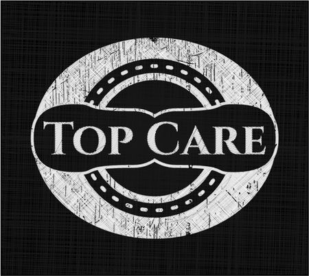 Top Care chalk emblem written on a blackboard