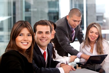 business group working at the office with a computer