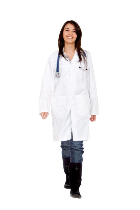 friendly female doctor smiling isolated over white