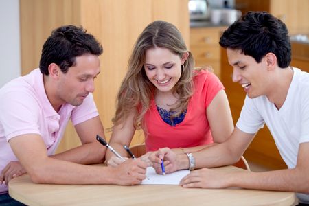 group of casual people having a meeting at home