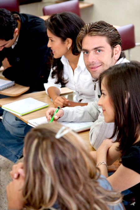 Group of students on the classroom studying