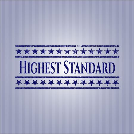 Highest Standard badge with denim background