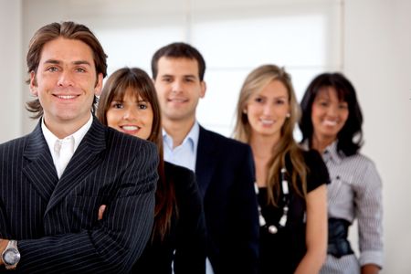 business-group-looking-happy-office-42665152 Business group looking happy at the office