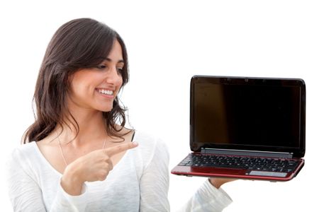 Beautiful happy girl with a computer isolated on white