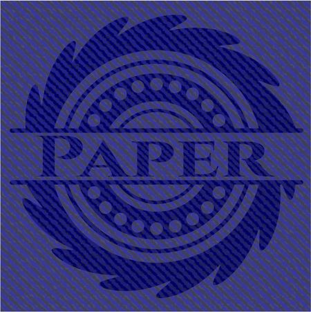 Paper emblem with jean background