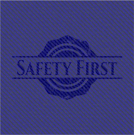 Safety First emblem with jean background