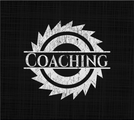 Coaching chalkboard emblem written on a blackboard