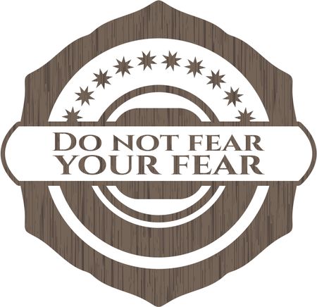 Do not fear your fear badge with wood background