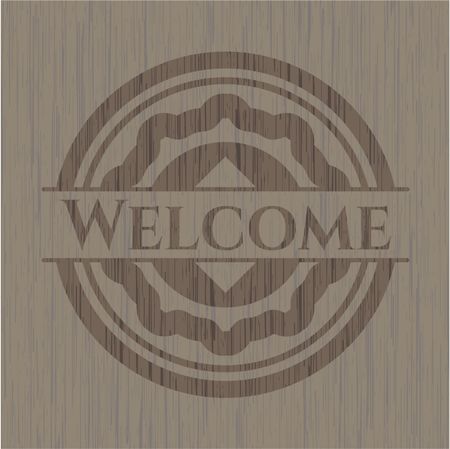 Welcome badge with wood background