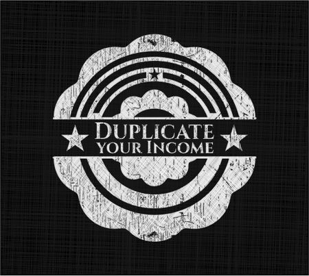 Duplicate your Income written on a blackboard