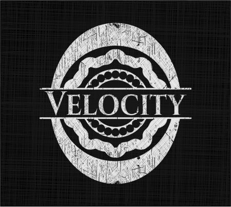 Velocity chalk emblem written on a blackboard