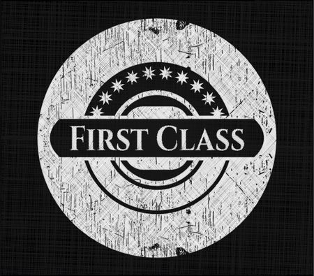 First Class chalk emblem written on a blackboard