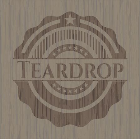 Teardrop badge with wood background