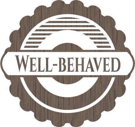Well-behaved badge with wooden background
