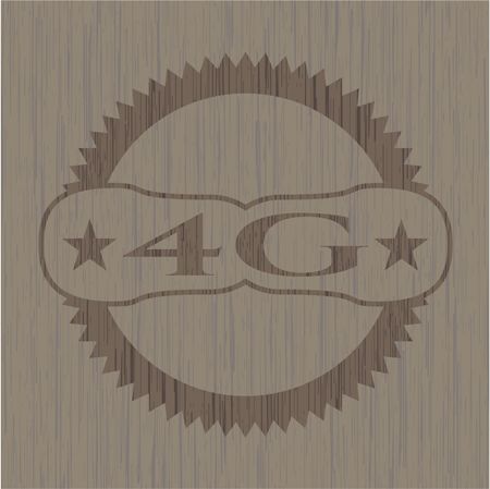 4G badge with wooden background