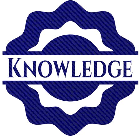 Knowledge emblem with jean background