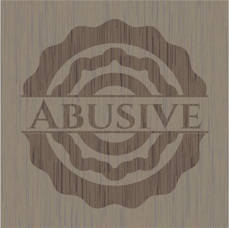 Abusive vintage wooden emblem