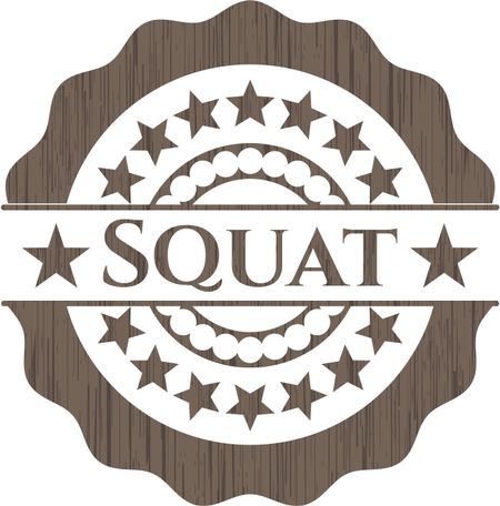 Squat wooden emblem