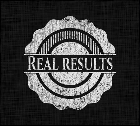 Real results written on a chalkboard