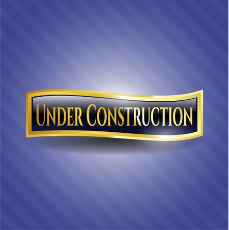 Under Construction gold emblem