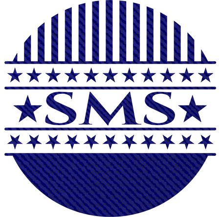 SMS badge with denim texture